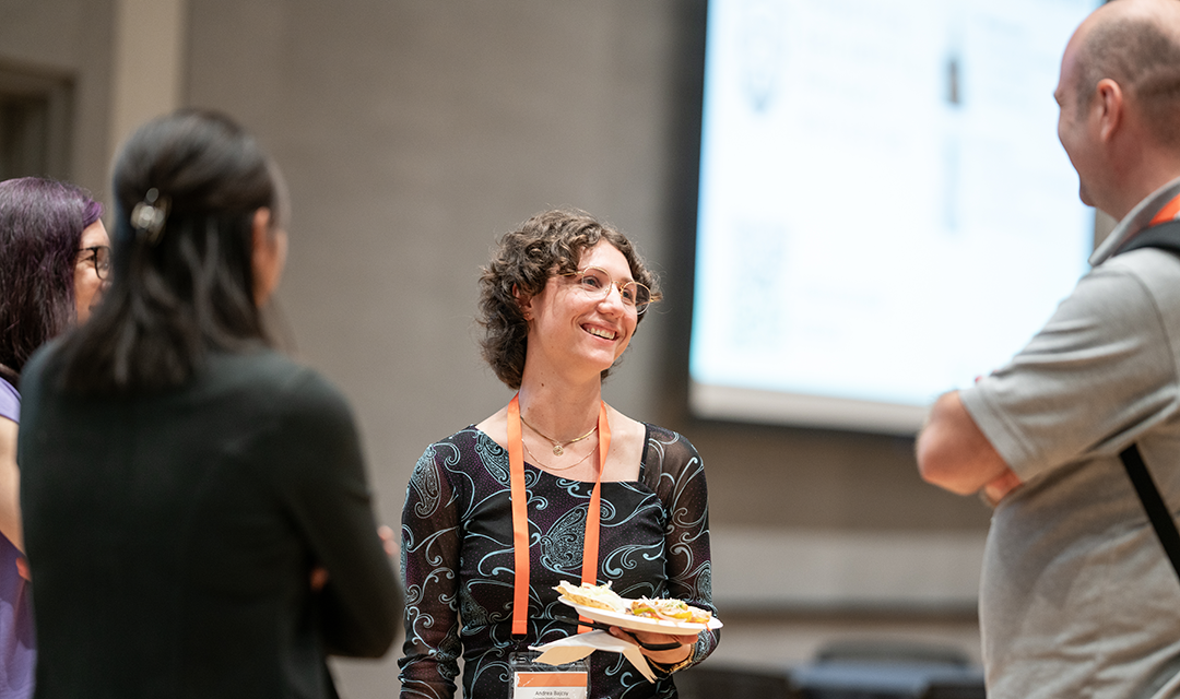 Photo of individuals talking at a CyLab networking event
