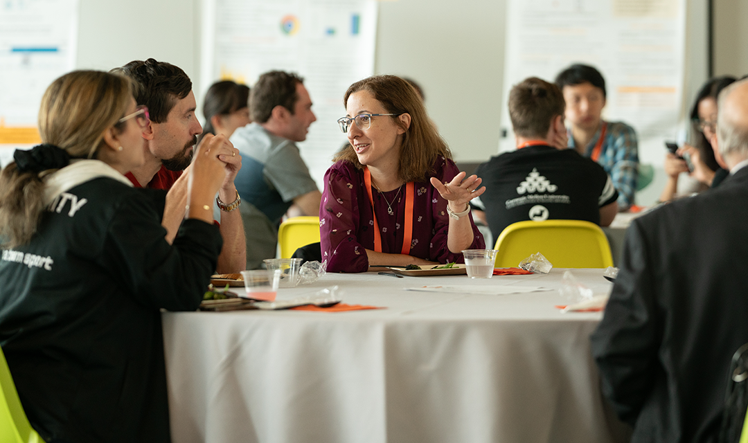 Photo of individuals talking at a CyLab networking event