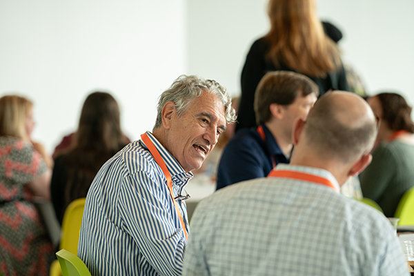 Photo of two people talking during lunch at the CyLab Partners Conference