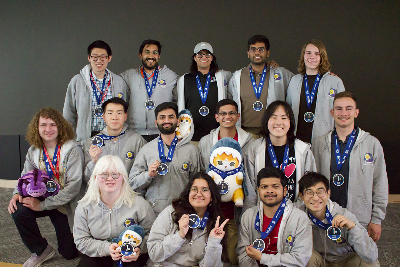 Group photo of CMU's winning team at MITRE eCTF